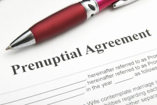 a closeup of a prenuptial family law agreement