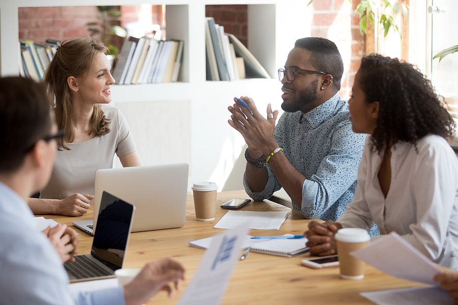 african american male making proposals during a meeting