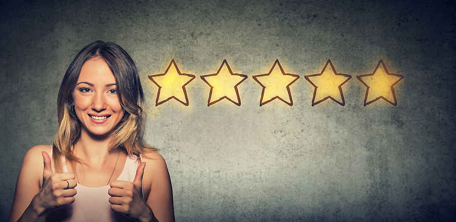 Cheerful beautiful woman smiling showing thumb up like gesture choosing five stars rating for Weber Dispute Resolution reviews. 